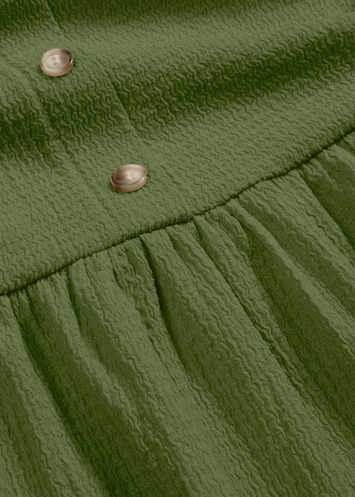 Haljina od jerseya midi dužine s volanima i dekorativnim kopčanjem na gumbe