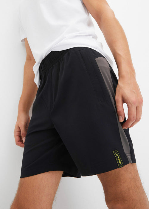 Sportske kratke hlače s patentnim zatvaračem na džepovima od materijala koji se brzo suši