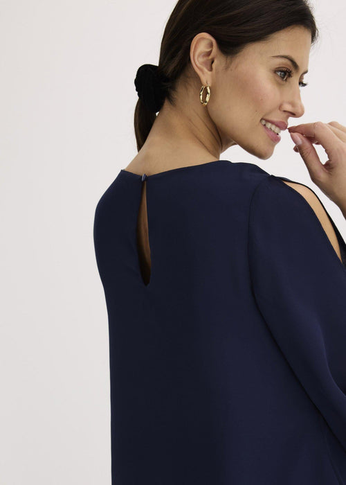 Asimetrična bluza slojevitog izgleda