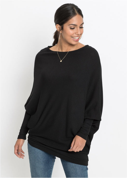 Oversize pulover s asimetričnim rubom