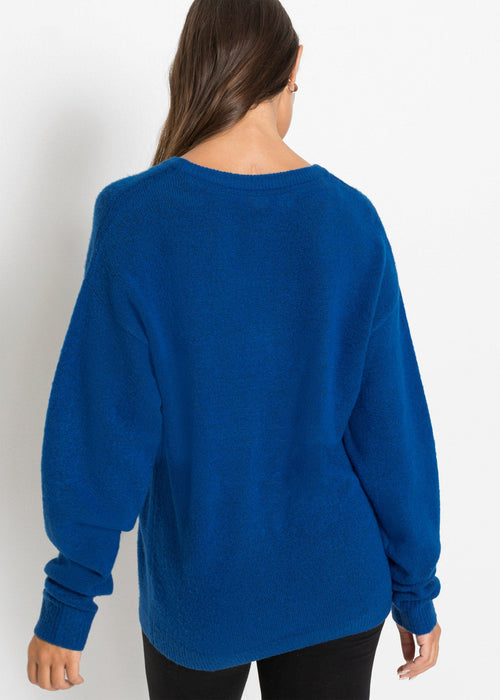 Oversize pleteni pulover oversize kroja s rupičastim uzorkom
