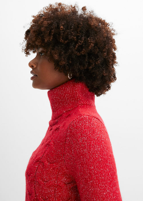 Pleteni pulover s pletenicama kraćeg kroja